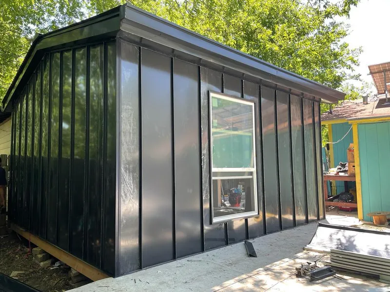 Black standing seam metal wall panels for Metal Roof Installation in South Haven