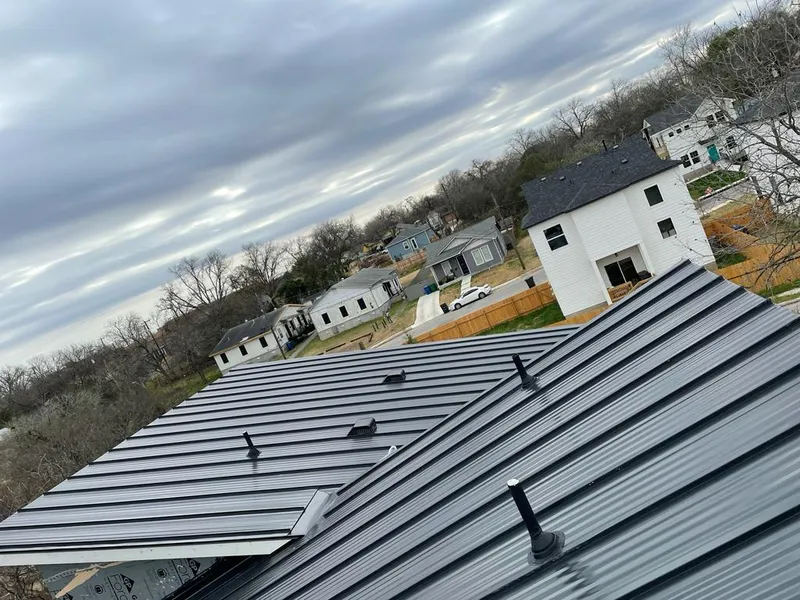 Standing seam metal roof panels with vents for Skylight Repair in South Haven